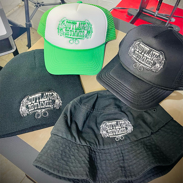 Embroidered hats with “Outlaw” design